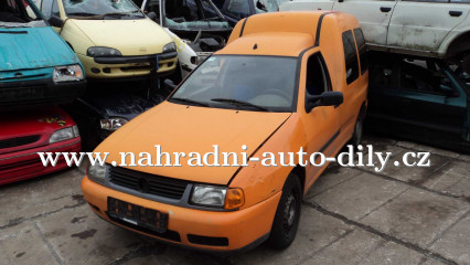 VW Caddy oranžová na náhradní díly Praha